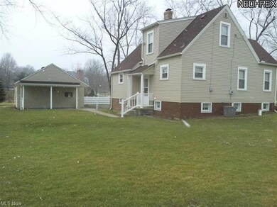 The lot is level with mature trees, babbly creek a