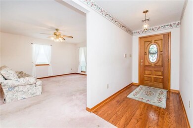 Foyer with wood flooring