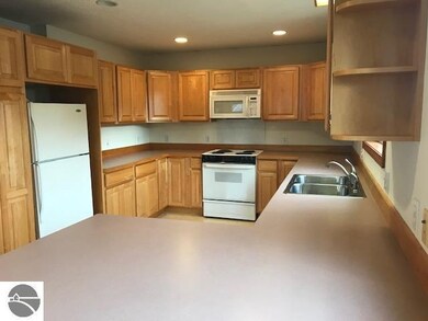 404 Bridge St, Elk Rapids, MI 49629 - photo 3