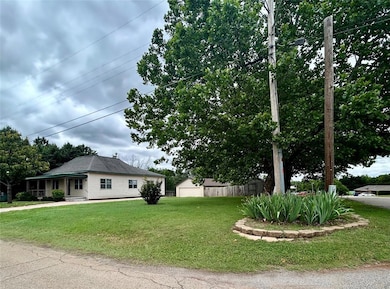 View of corner lot with gorgeous mature trees!