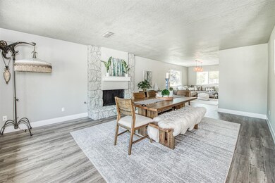Formal living and dining rooms, stone, wood burnin