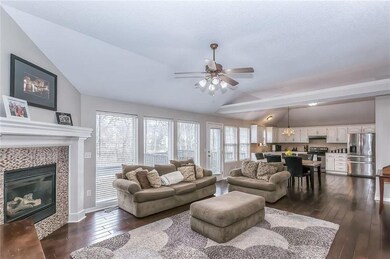 GREAT ROOM WITH CORNER GAS FIREPLACE, WOOD FLOOR O