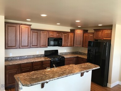 Kitchen. Photo of similar home.