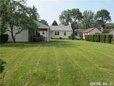 Exterior Back. The large back yard is surrounded b