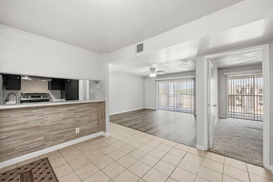 Spacious open floor plan with neutral paint and co