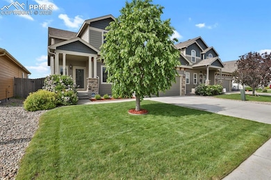 Charming covered front porch, ideal for morning coffee while soaking up the sun and enjoying serene natural views.
