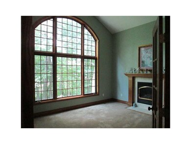 Living Room. With gas fireplace, french doors and 