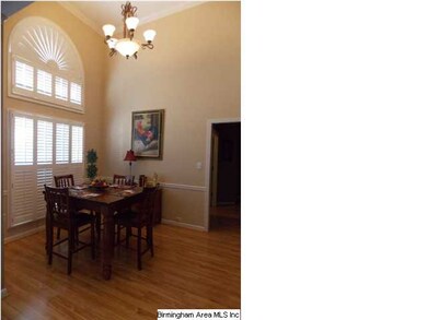 Dining room with vaulted ceiling