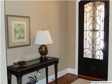 Foyer with hardwood flooring throughout and Steel 