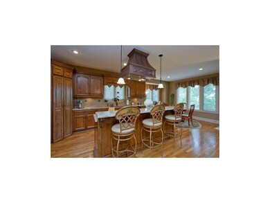 Custom kitchen with walk-in pantry and gorgeous co