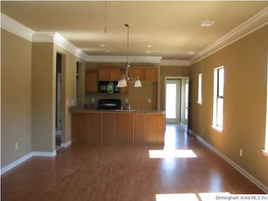 Den and dining room are open to kitchen that has a
