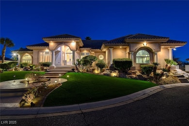 Mediterranean / spanish home featuring a tile roof