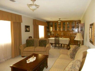 formal living room and formal dining room. full wa