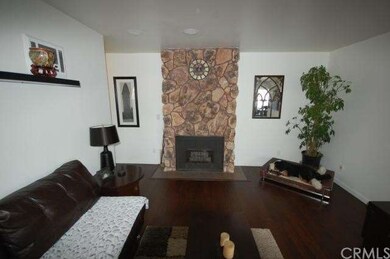 Electric fireplace turns on with a switch.