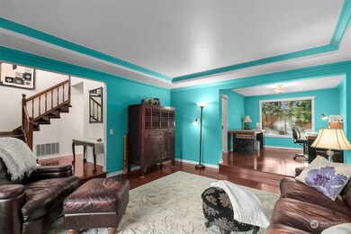 Large spacious living room flows into dining room