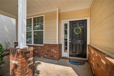 Plenty of room on the covered front porch for a couple of rocking chairs.