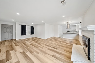 Living room has fireplace
