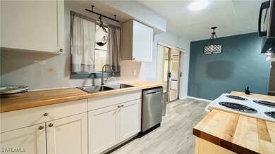 Bathroom with vanity, a shower with shower curtain