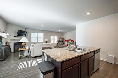 Kitchen looing into living room