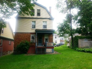 Exterior Back. Nice back yard and cozy porch.  Not