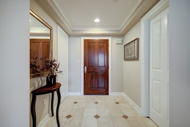 Large foyer with powder room on the right and larg