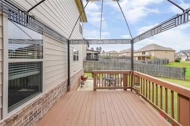 Wooden terrace featuring a residential view