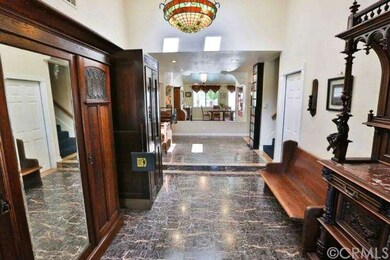 The entry features a see through view to the dinin