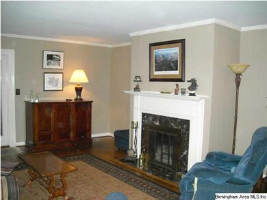 Living room w/wood burning fireplace
