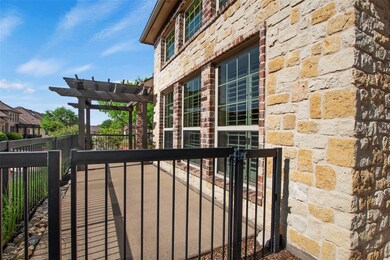 View of gate featuring fence and a pergola