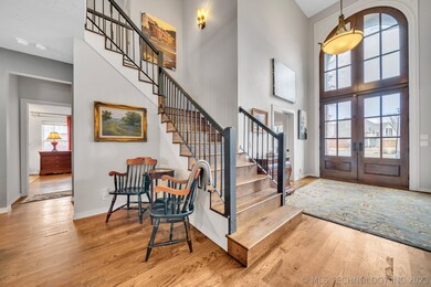 Front entry / foyer. Steel doors with tons of wind