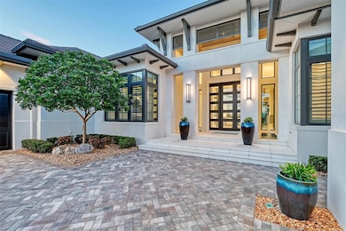 Dual lighted fountains at front entry