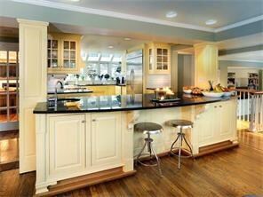 Beautiful kitchen that opens up to the sunroom