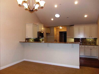 Kitchen. Loads of cupboards and large breakfast ba