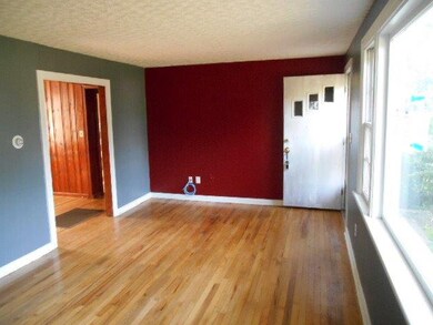 The living room flows nicely into the dining area.
