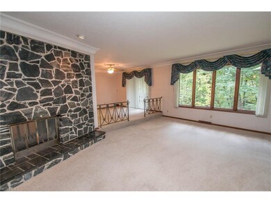 Living and Dining rooms with beautiful wooded view