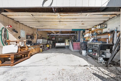 Garage featuring a workshop area