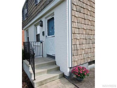 Exterior Front. Rebuilt front steps and new railin