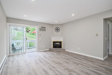 Livingroom with Sliders to private deck.
