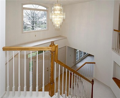 Foyer viewed from the top of the stairway, outside the master bedroom.