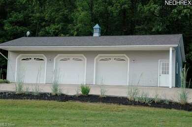 Additional detached 3+ car garage.