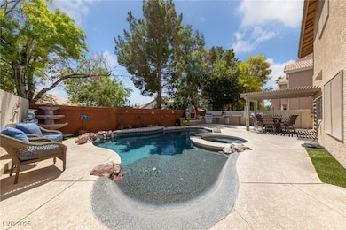 Heated Pool with Beach Entry and Spa