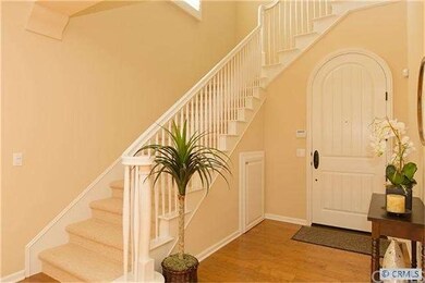 Foyer and stairs to Master suite and 2 additional 