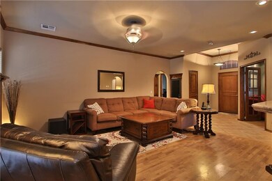 Living area view towards front door and study. Con