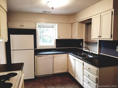 Functional Kitchen with Ceramic Tile Flooring