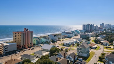 Bird's eye view with a beach view and a water view