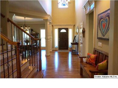 Wide 2-story foyer - open to formal dining room wh