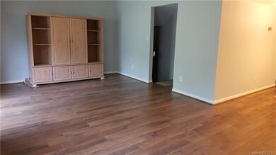 The Living Room opens to the Dining Room and recei