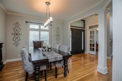 HARDWOOD Flooring at the Entry, & Dining Room, and