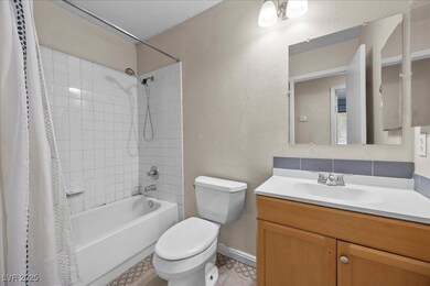 Bathroom featuring shower / bath combo with shower