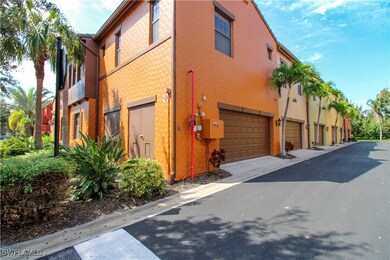 View of property with a garage